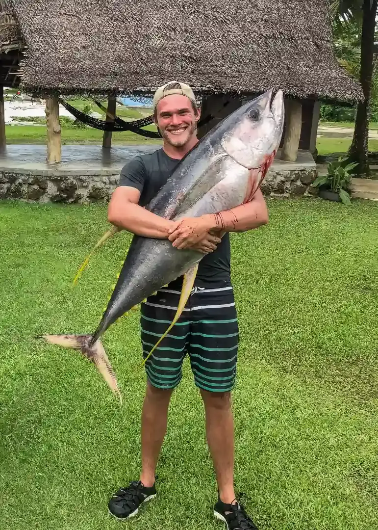 Joseph's first Thumbtack profile picture featuring him and his trophy tuna, symbolizing the humble beginnings of Generation Roofing in Upstate South Carolina.